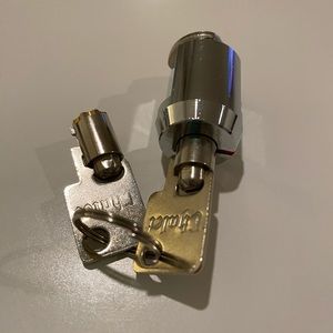 Cylinder storage unit lock